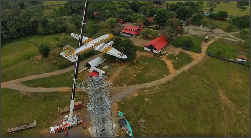 C-47 HK-3349 at Tiuma park hoisted onto the tower!