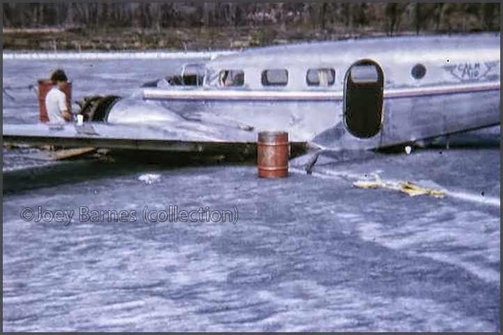 Beech 18 of Calm Air through the ice on Reindeer Lake, Manitoba.