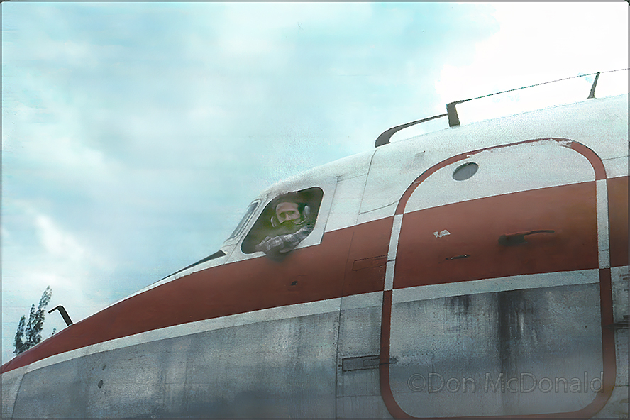 Don McDonald in th left seat of the Conair DC-4